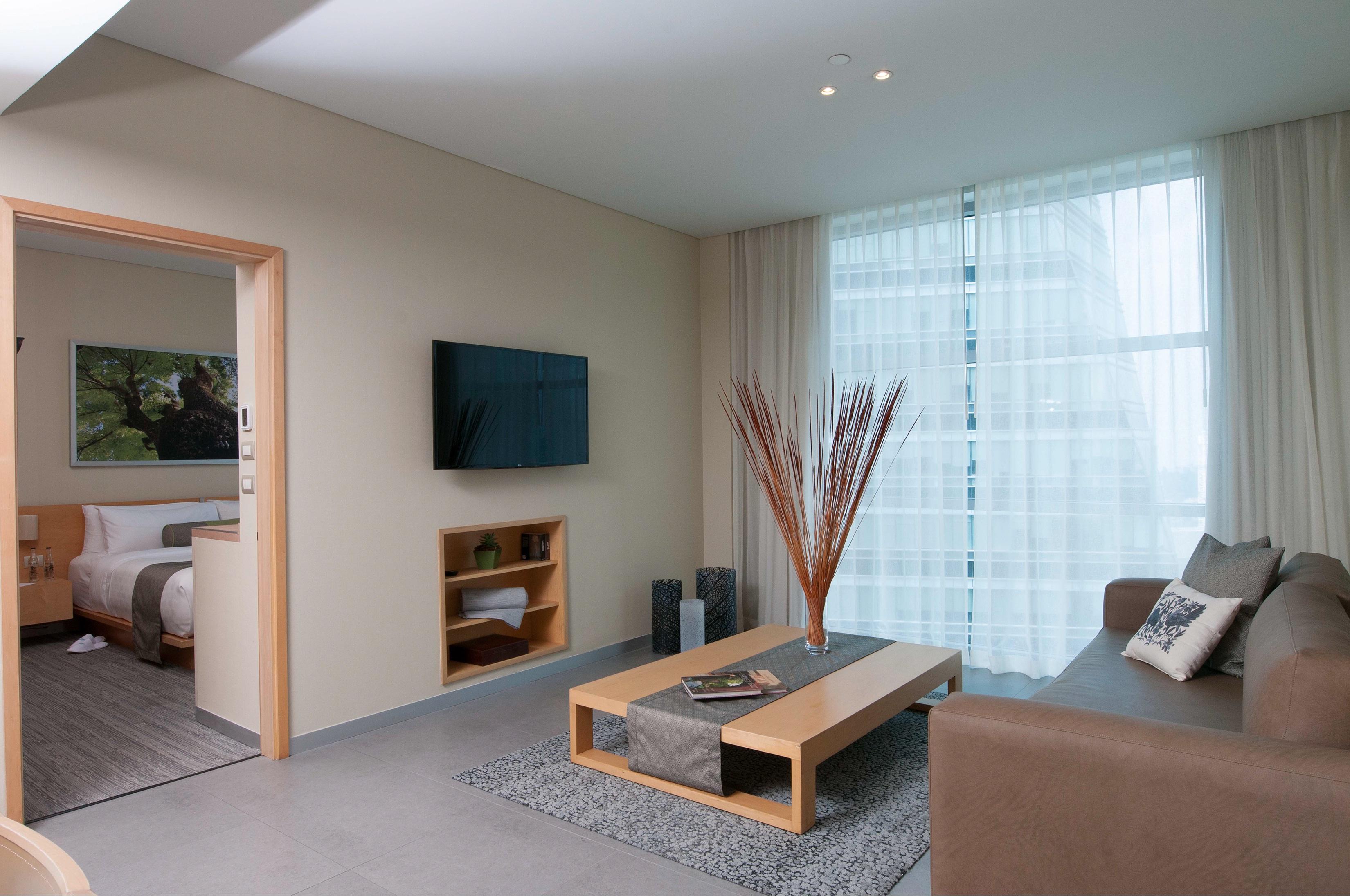 Stadia Suites Mexico City Santa Fe Buitenkant foto A living room in a hotel suite